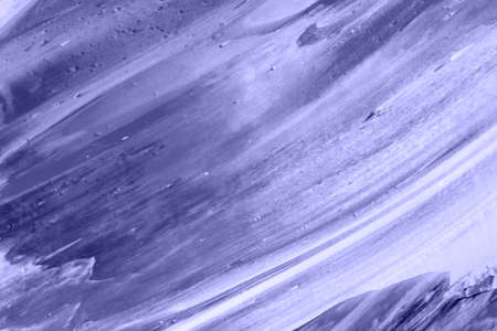 Abstract painted background in very peri color.の写真素材
