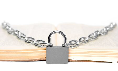 padlock with old book on backgroundの写真素材
