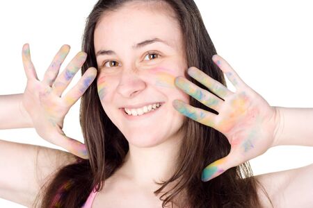 happy girl with colored face showing chalk stained handsの写真素材