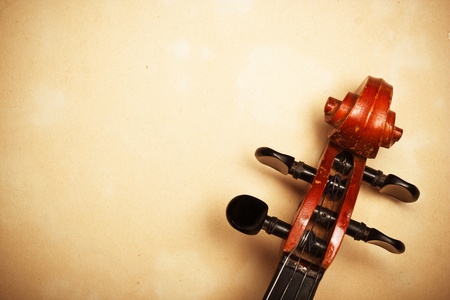 old violin detail on paper with copy-spaceの写真素材