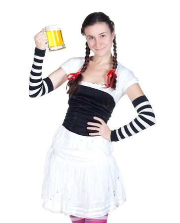 girl wearing in a traditional german dirndl costume with a beer mugの写真素材