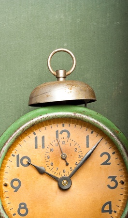 vintage green alarm clock vertical banner with copy-spaceの写真素材