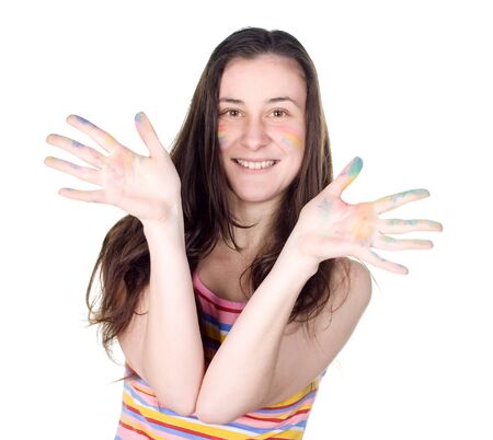smiling girl with colored face showing chalk stained handsの写真素材