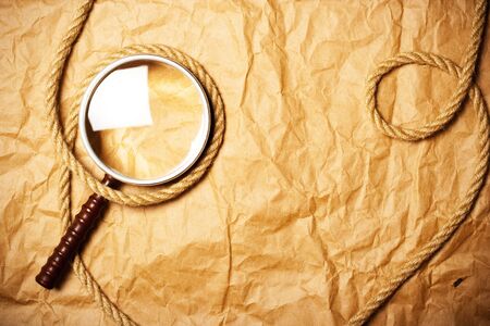 magnifying glass and ropeの写真素材