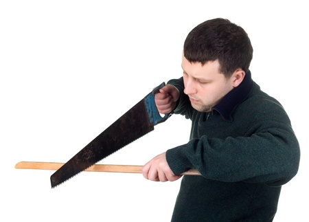 yound man with a sawの写真素材