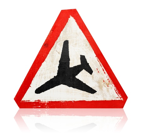 wooden grungy painted &quot,low flying aircraft&quot, road sign isolated on whiteの写真素材