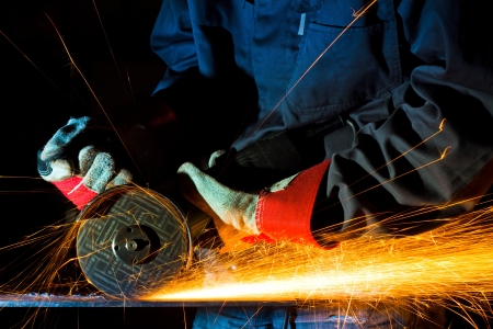 sparks while grinding ironの写真素材