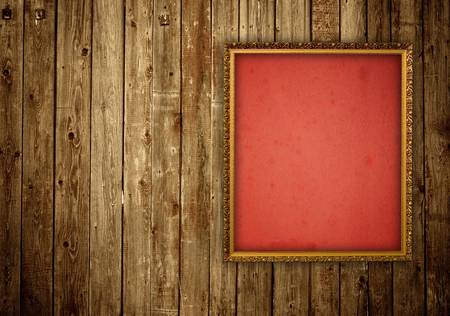picture frame on wooden wallの写真素材