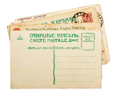 Vintage 1900s russian postcards stack isolated on white