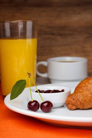 Breakfast with croissant and juiceの写真素材