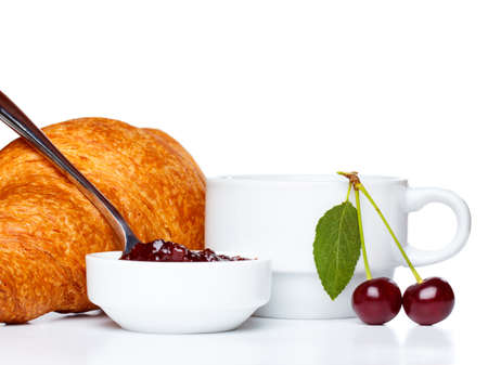 Croissant with coffee and cherry jamの写真素材