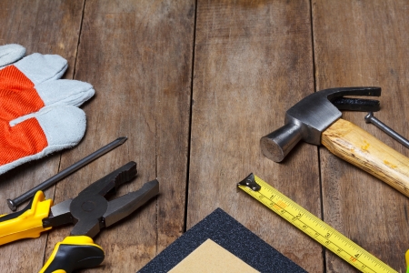 Construction instruments on wooden tableの写真素材