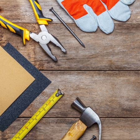 Construction instruments on wooden tableの写真素材