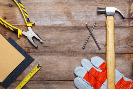 Construction instruments on wooden tableの写真素材
