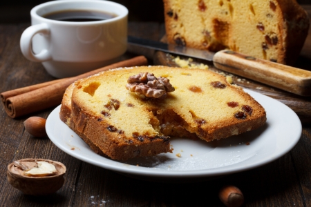 Fruitcake with raisin on wooden table still lifeの写真素材