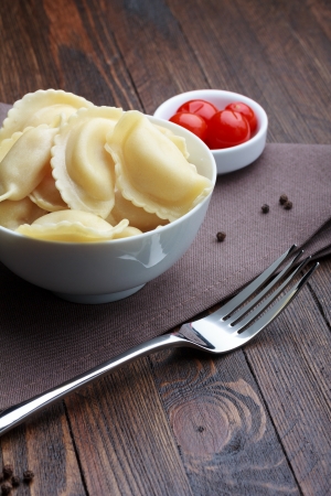 Steamed meat dumplings, traditional pelmeni or varenyky dishの写真素材