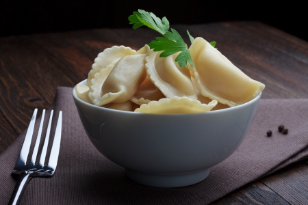 Steamed meat dumplings, traditional pelmeni or varenyky dishの写真素材