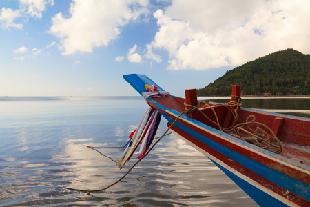 Fisherman small wooden boat in Thailandの写真素材