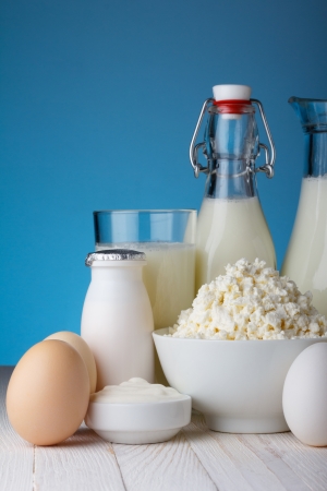 Dairy products on wooden table close-upの写真素材