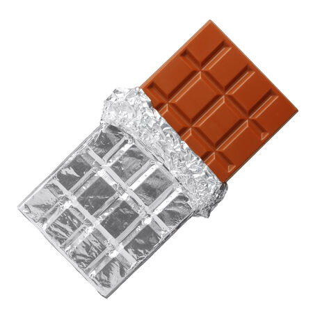 Milk chocolate bar in silver foil, half opened, isolated on whiteの写真素材