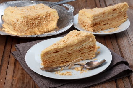 Layer cake on wooden tableの写真素材
