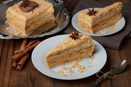 Layer cake with anise and cinnamon decorationの写真素材
