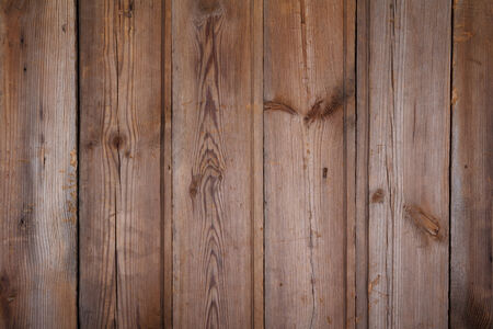 Old scratched wooden table background top viewの写真素材