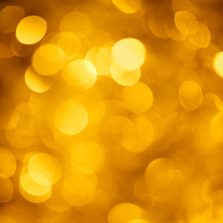 Golden lights bokeh abstract の写真素材