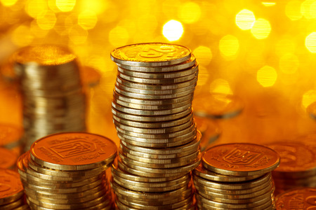 Stack of golden ukrainian coinsの写真素材