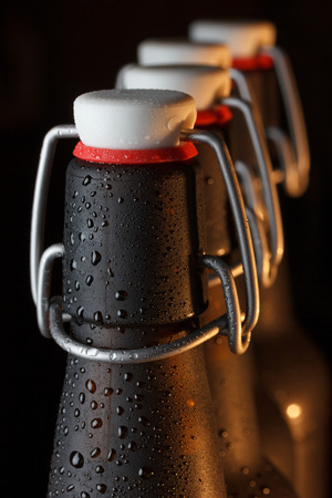 Vintage beer bottles with swing top macroの写真素材