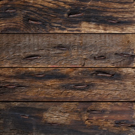 Dark rustic wooden planks with rustic nails の写真素材