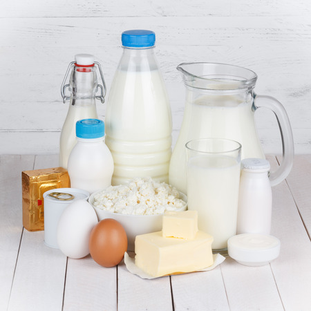 Dairy products on white wooden table still lifeの写真素材