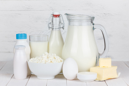 Dairy products on wooden tableの写真素材