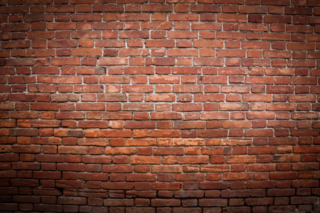 Old grunge red brick wall textureの写真素材