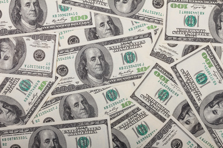 One hundred dollar bills pile textureの写真素材