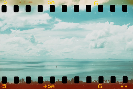 Tropical sea high view, with islands and ship on horizon, vintage film stylized and stainedの写真素材
