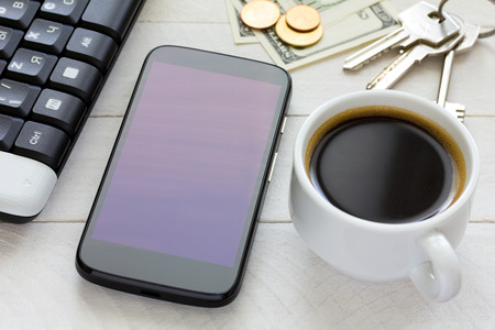 Smartphone oin wooden tableの写真素材