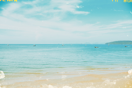 Tropical beach and Andaman sea, retro stylized and tonedの写真素材