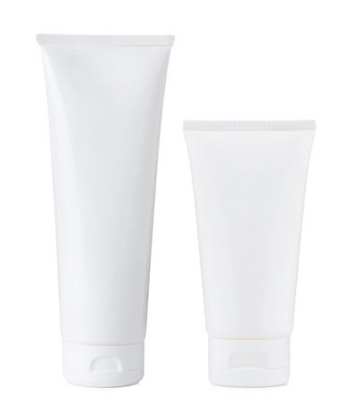 Blank white plastic cosmetics paste or gel tube, big and small, isolated on white backgroundの写真素材