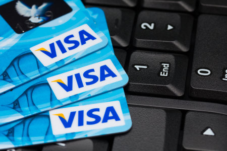 KIEV, UKRAINE - July 7: Pile of Visa cards on keyboard, in Kiev, Ukraine, on July 7, 2014.のeditorial素材