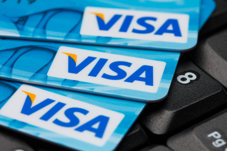 KIEV, UKRAINE - July 7: Pile of Visa cards on keyboard, in Kiev, Ukraine, on July 7, 2014. Shallow dof.のeditorial素材