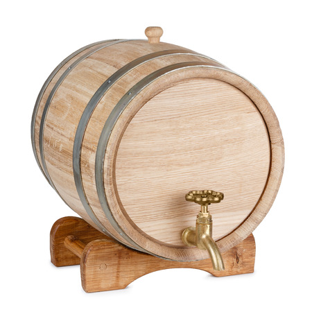 New clean oak wooden barrel on rack, isolated on white background, entire object in focusの写真素材