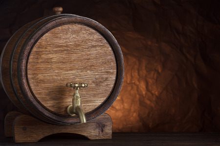 Beer barrel on wooden table still-life with copy spaceの写真素材