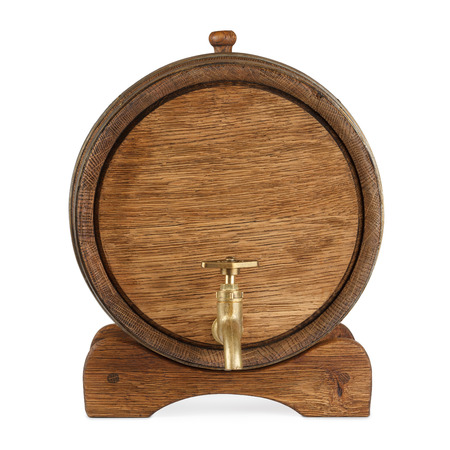 Old wooden barrel on rack front view isolated on whiteの写真素材