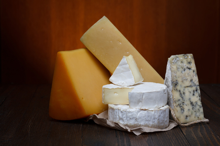 Cheese assortment on wooden tableの写真素材