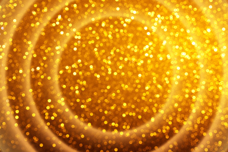 Warm bokeh yellow lights background with glowing circle wavesの写真素材