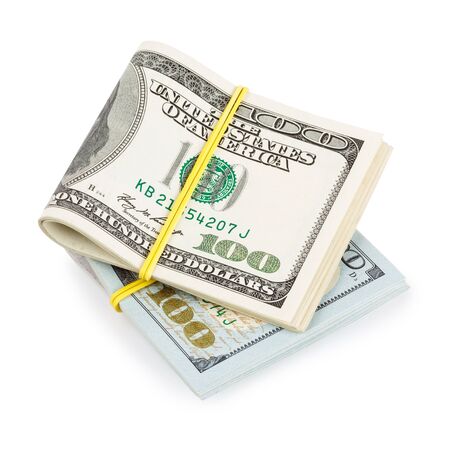 Hundred Dollar bills folded and tied with rubber band isolated on whiteの写真素材