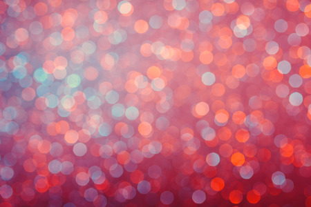 Vintage colored bright glowing lights bokeh backgroundの写真素材