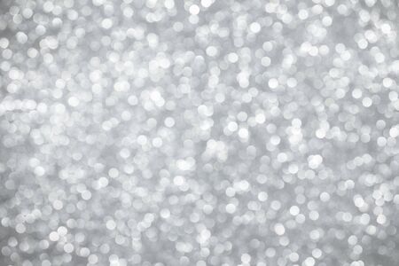 Silver bokeh lights abstract backgroundの写真素材