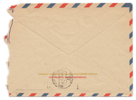 Vintage worn envelope with meter stamp. Text on russian: "Congratulatory letters to other cities please send in advance."の写真素材